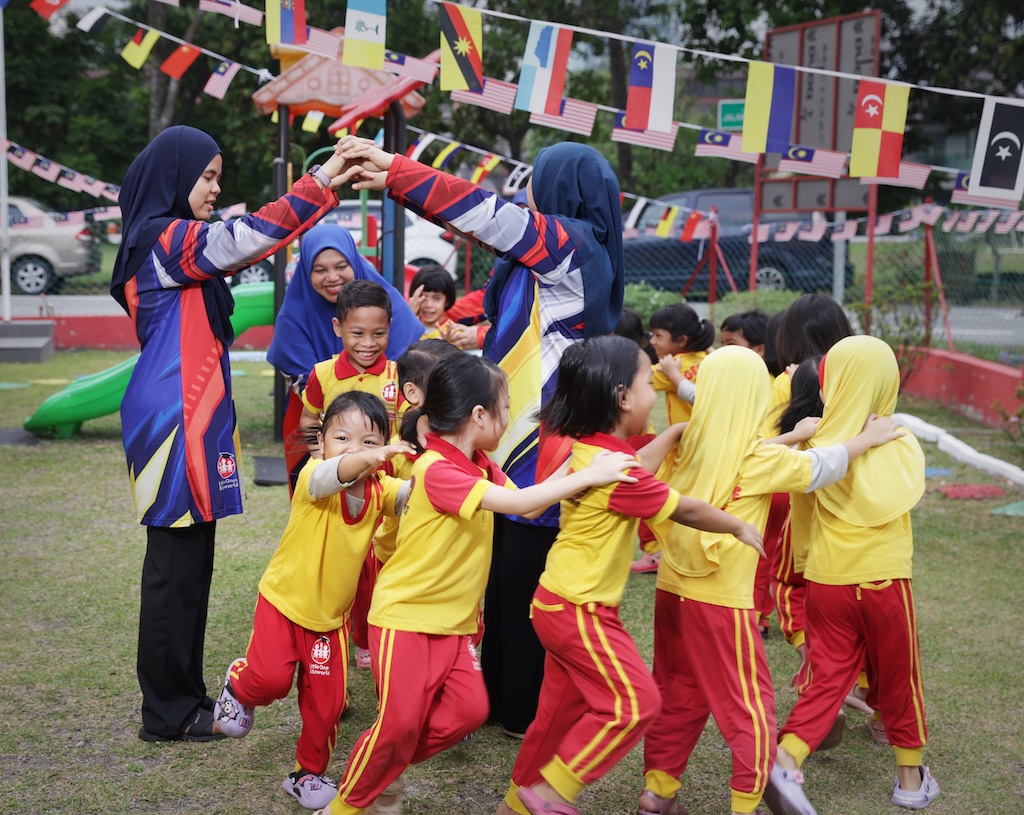 Children and educators enjoying an outdoor activity