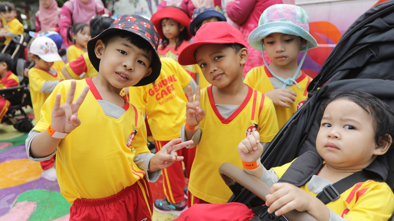 LOE children enjoying a cheerful activity in a nurturing environment